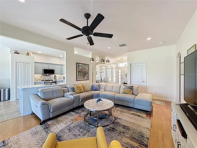 a view of a chairs and table in a patio