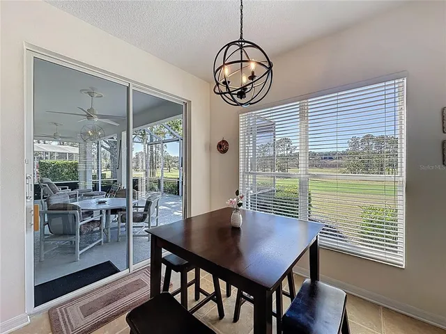 a view of a large body of water with a building in the background