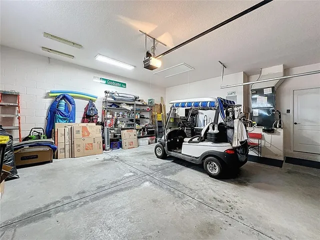 a view of a swimming pool and an outdoor seating