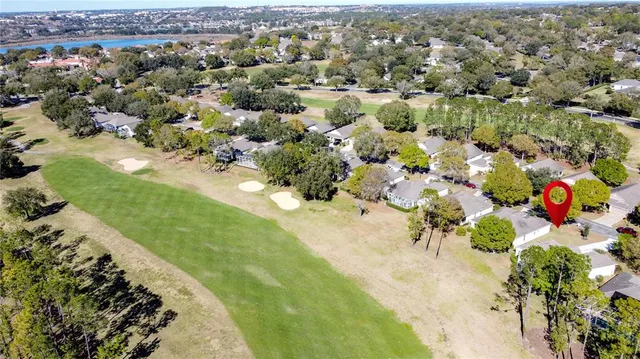 an aerial view of a house with a garden