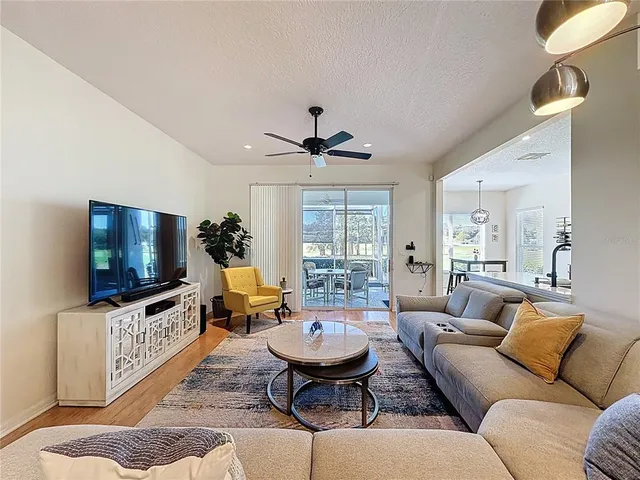 a spacious en suite bathroom with double sink and a mirror
