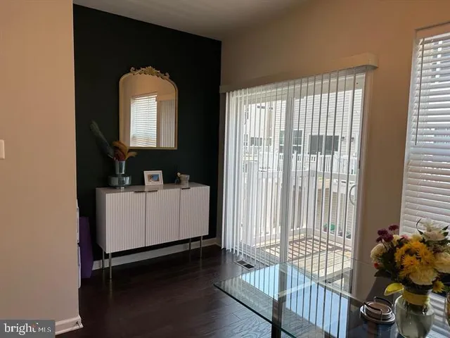 a view of livingroom with furniture and floor to ceiling window