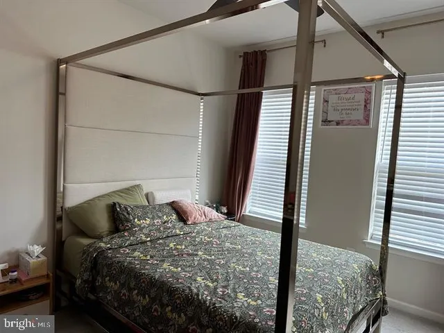 a room with lots of different colored cloths