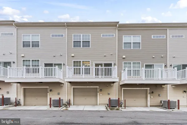 a front view of a building with a street