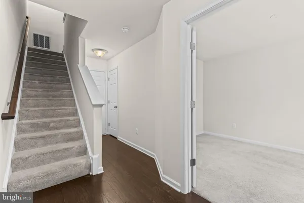 a view of an entryway with staircase