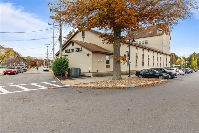 a view of street with parked cars