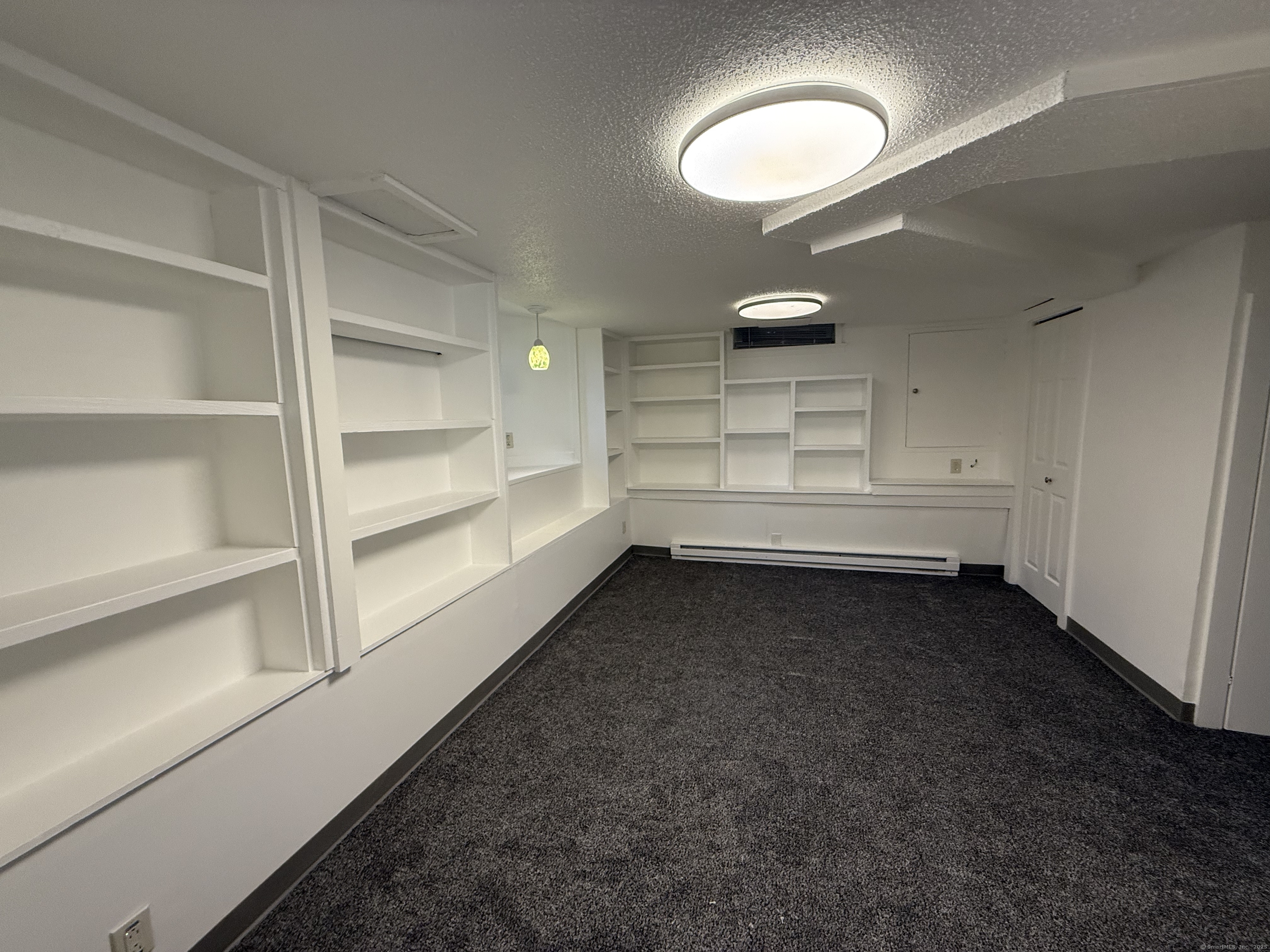 1 1/2 Stetson Street Norwich, CT 06360 - Photo 16 of 29 a view of a room with an empty space and a window