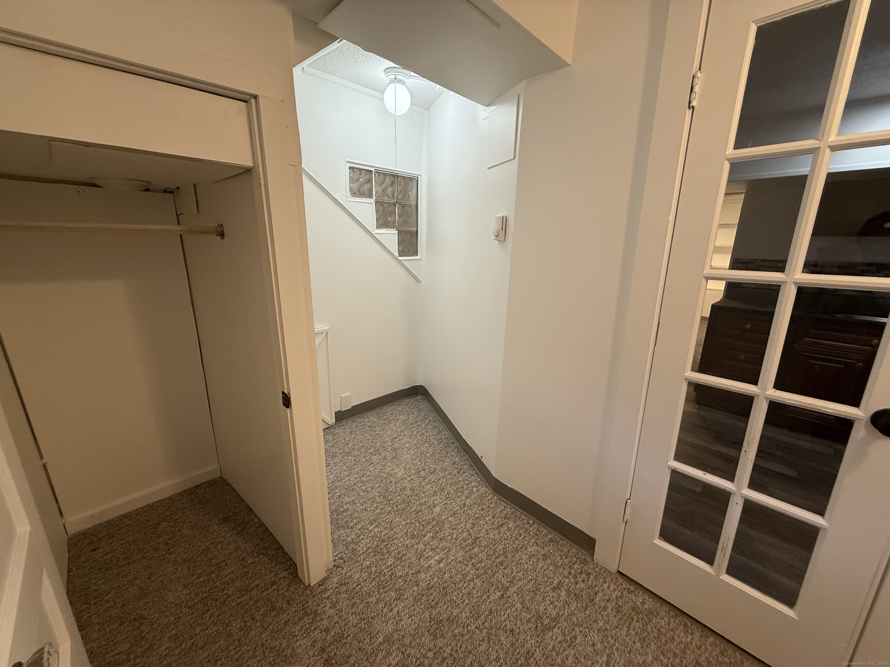 1 1/2 Stetson Street Norwich, CT 06360 - Photo 20 of 29 a view of an empty room with wooden floor and closet
