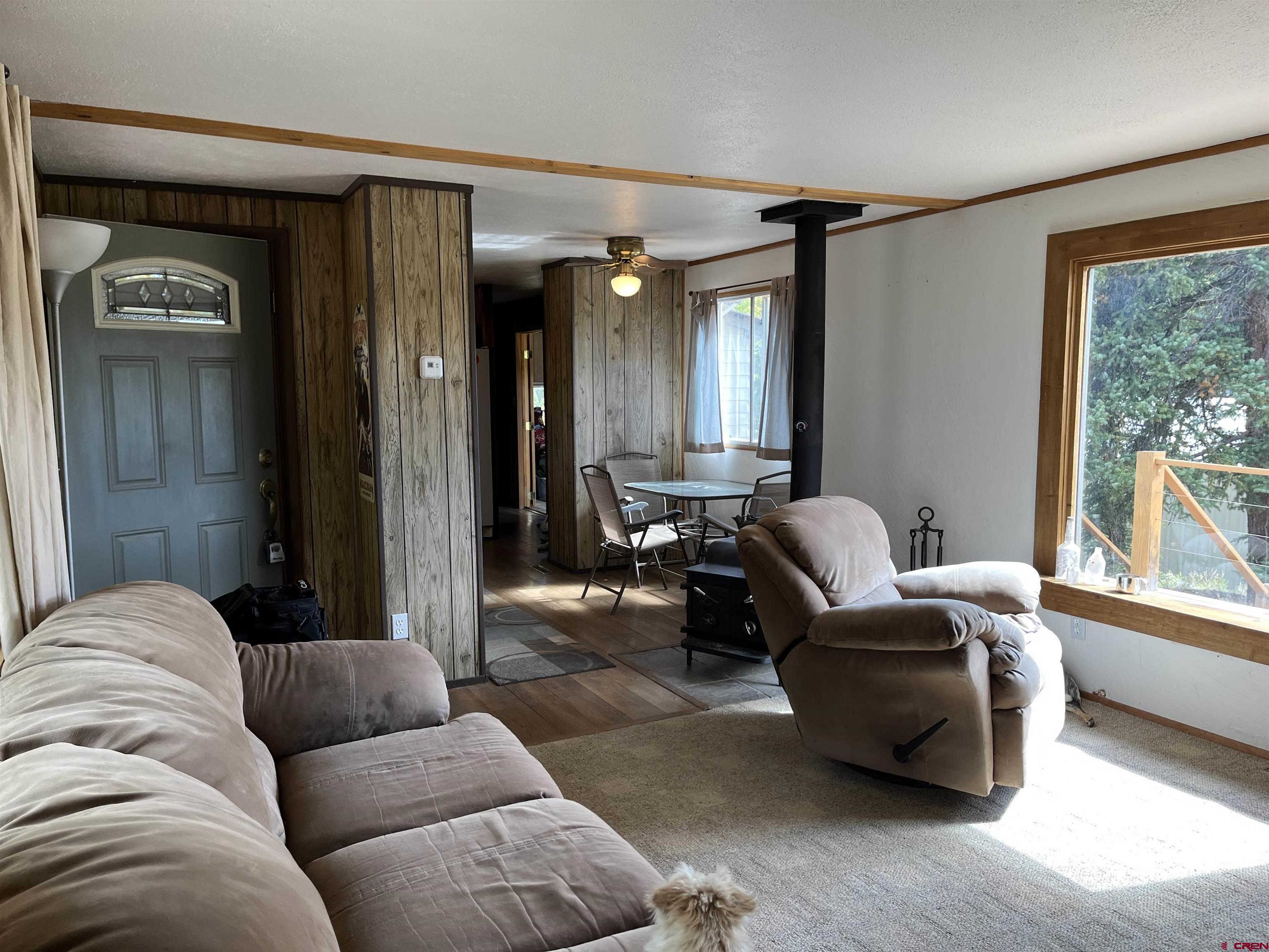 320 Forest Service Road Pitkin, CO 81241 - Photo 3 of 16 a living room with furniture and a window