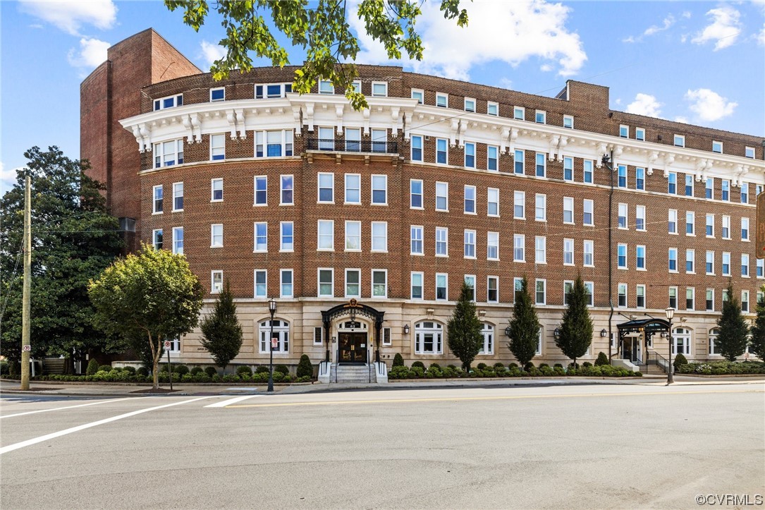 a front view of a building with street view