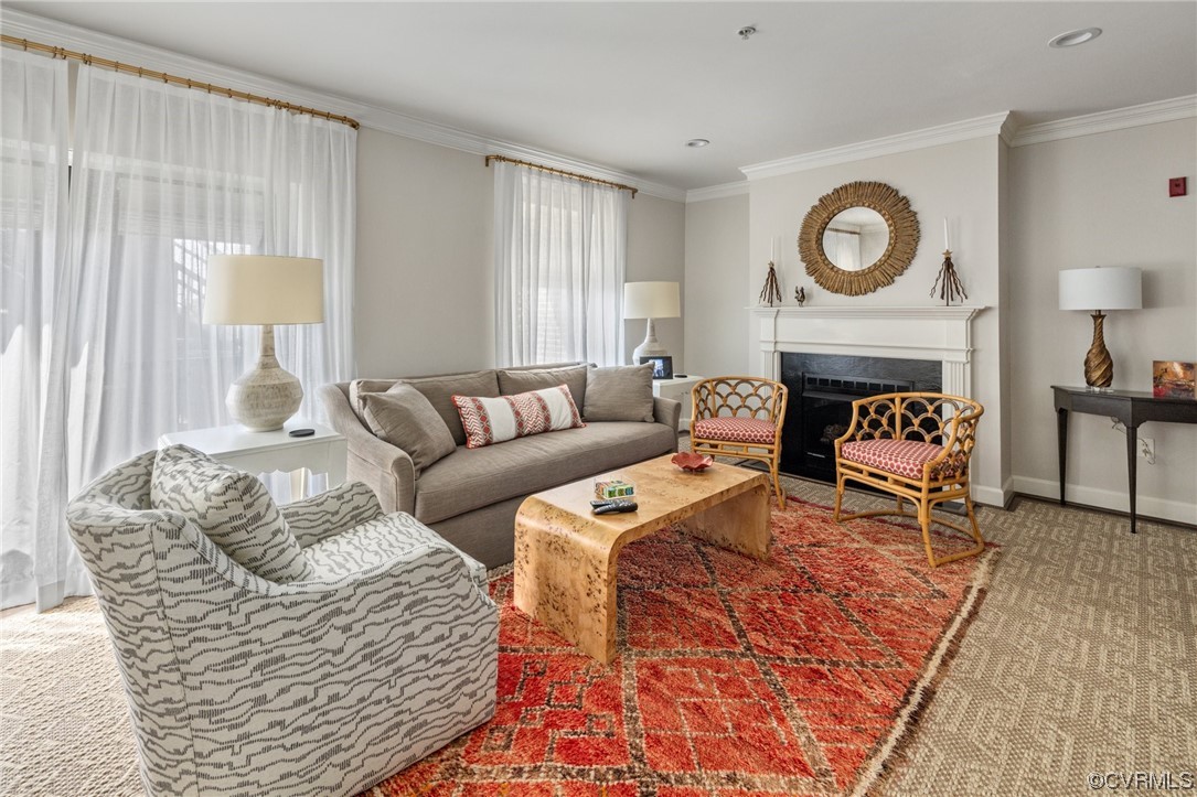 413 Stuart Circle, Unit U5E Richmond, VA 23220 - Photo 3 of 29 a living room with furniture and a fireplace