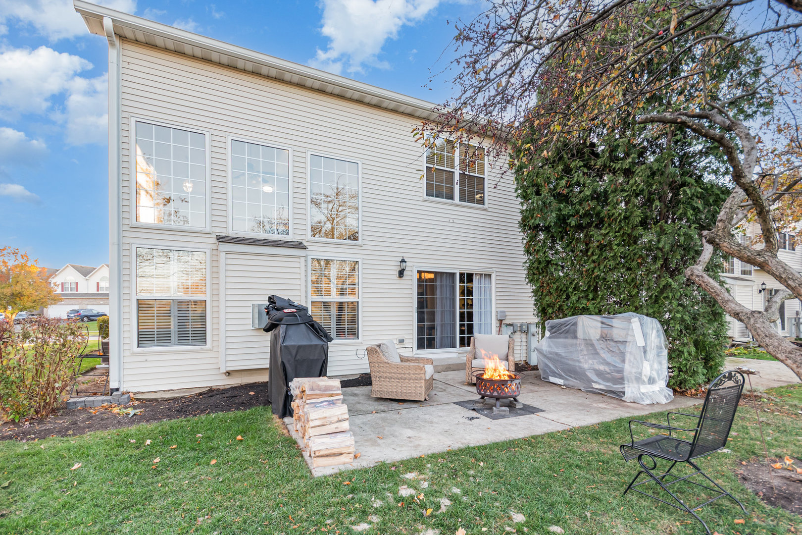 8 Lily Court Bolingbrook, IL 60440 - Photo 23 of 33 a view of a house with backyard and sitting area
