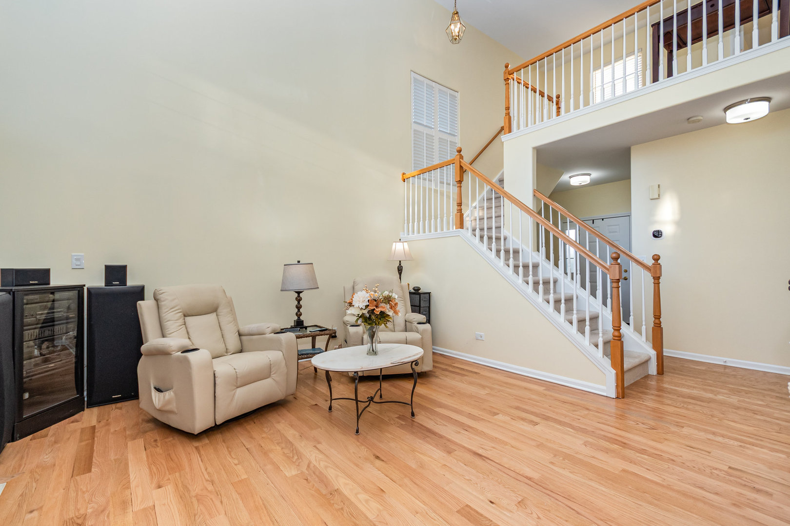 8 Lily Court Bolingbrook, IL 60440 - Photo 3 of 33 a living room with furniture and a wooden floor