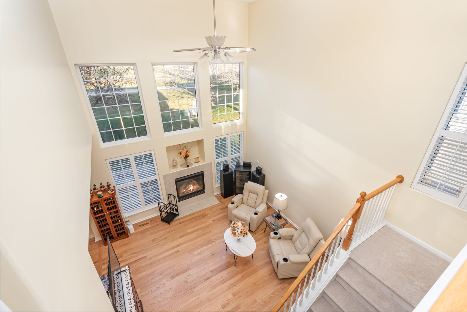 8 Lily Court Bolingbrook, IL 60440 - Photo 10 of 33 a view of a dining room with furniture a chandelier and wooden floor
