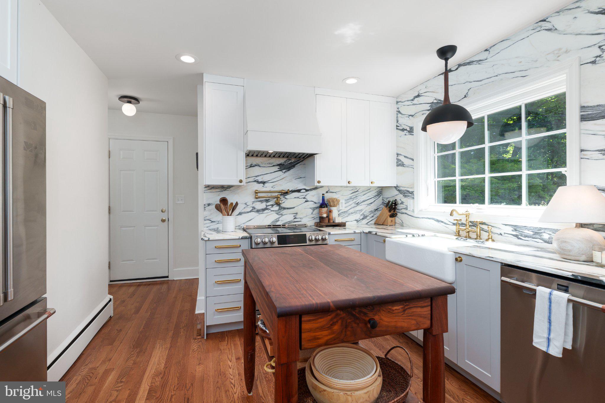 528 Mercer Road Princeton, NJ 08540 - Photo 14 of 43 Modern kitchen with elegant marble accents.