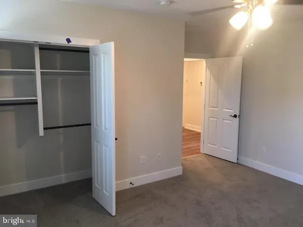 an empty room with closet