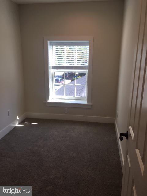 229 North High Street, Unit 3 West Chester, PA 19380 - Photo 6 of 16 a view of an empty room with a window
