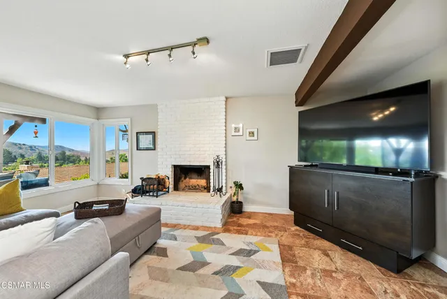 a view of a bench in a backyard