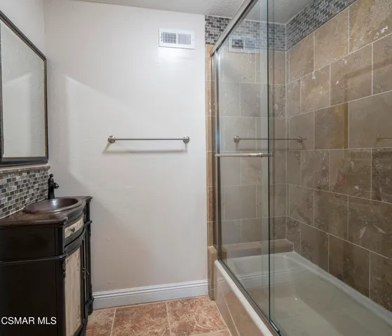 a view of a yard with an outdoor seating