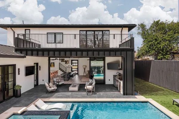 a front view of a house with patio