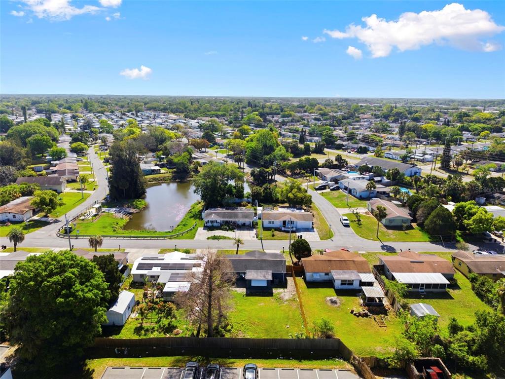 9033 Pegasus Avenue Port Richey, FL 34668 - Photo 54 of 56 an aerial view of a house with a garden