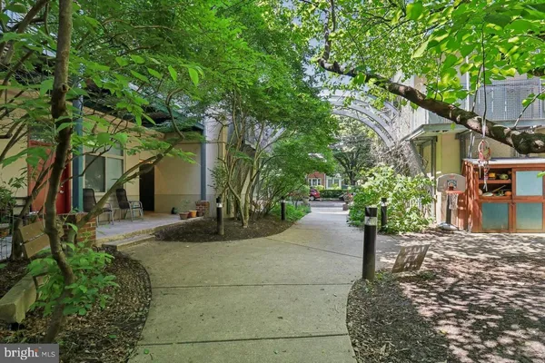 a view of a house with a tree