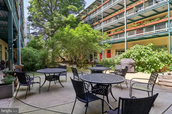 a view of a tables and chairs in patio