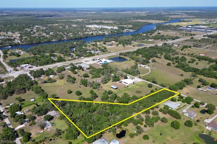 Styles Road Alva, FL 33920 - Photo 15 of 19 an aerial view of residential houses with outdoor space