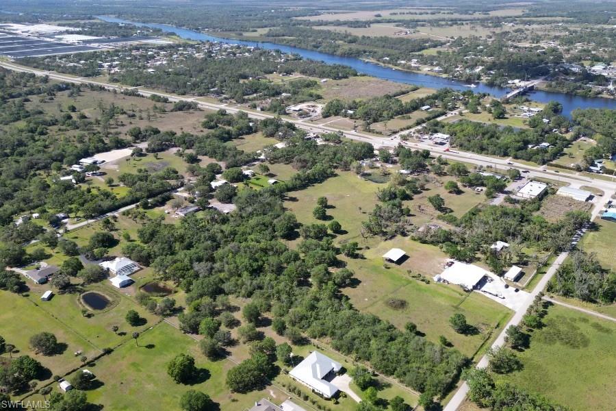 Styles Road Alva, FL 33920 - Photo 2 of 19 an aerial view of residential houses with outdoor space