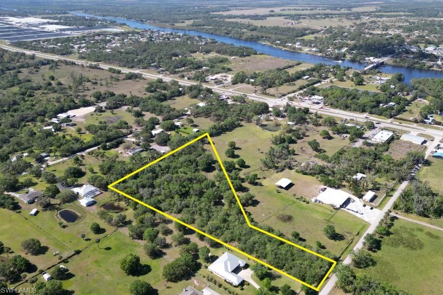 Styles Road Alva, FL 33920 - Photo 3 of 19 an aerial view of residential houses with outdoor space