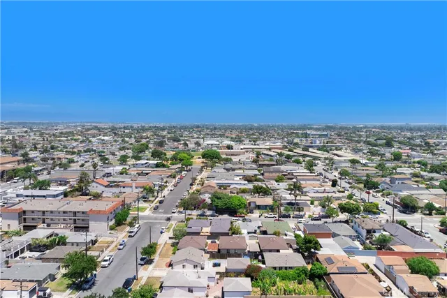 an aerial view of a city with lots of residential buildings