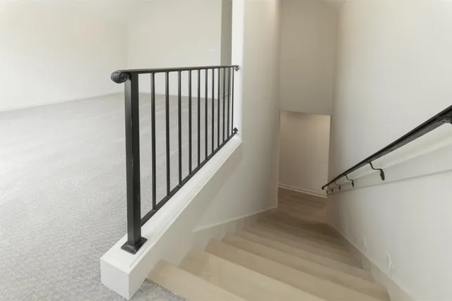 a view of a hallway with a window