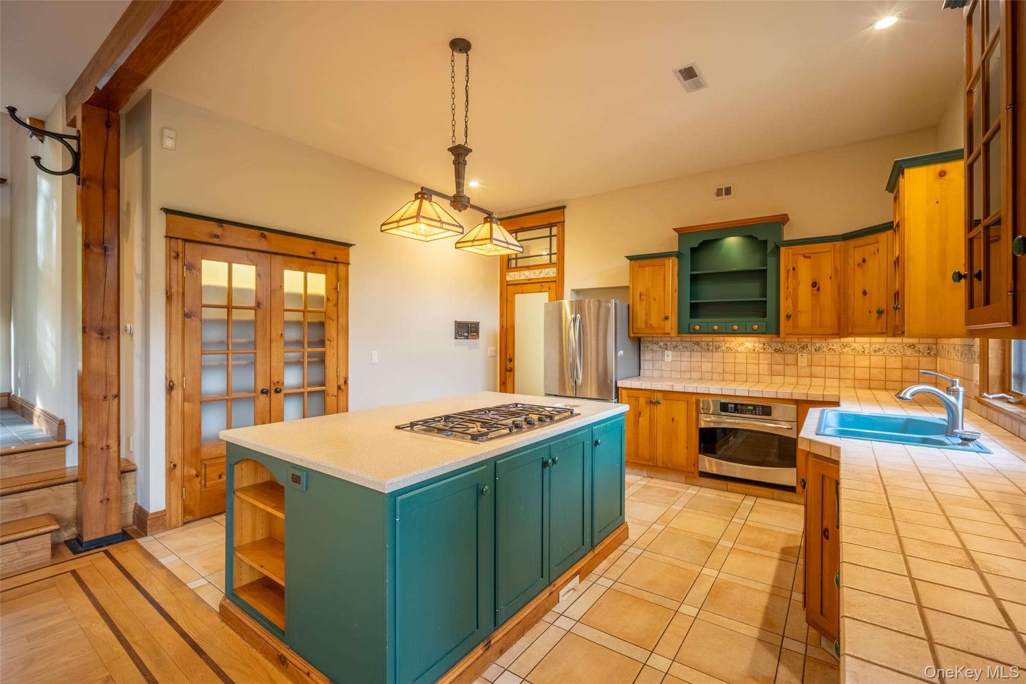 243 Hawleys Corners Road Highland, NY 12528 - Photo 12 of 44 a kitchen that has a stove and a table in it