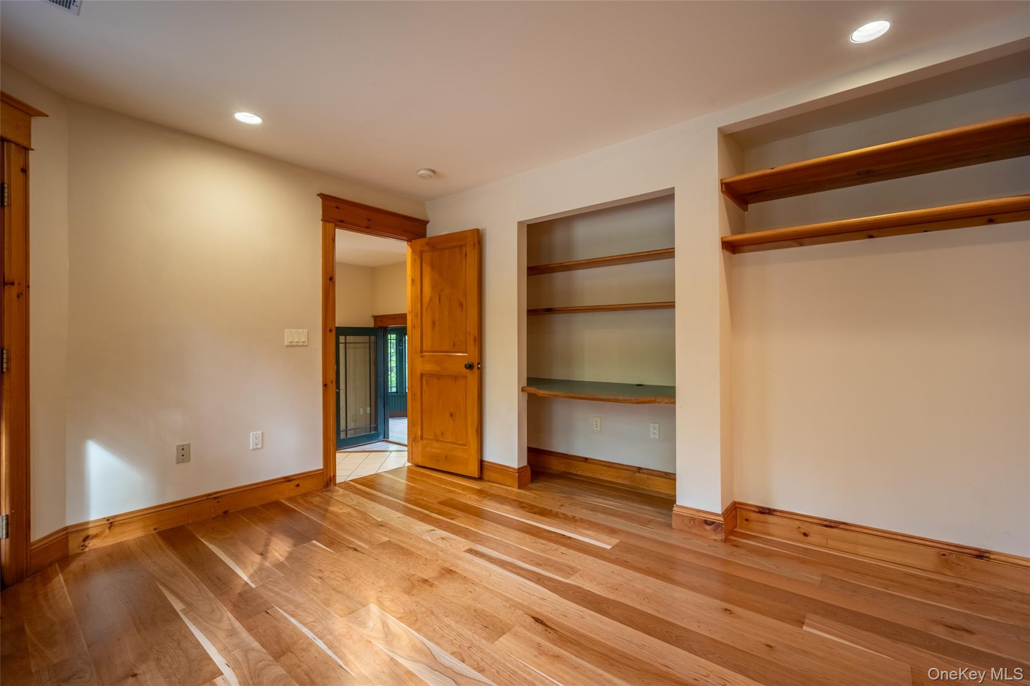 243 Hawleys Corners Road Highland, NY 12528 - Photo 15 of 44 a view of an empty room with wooden floor and closet