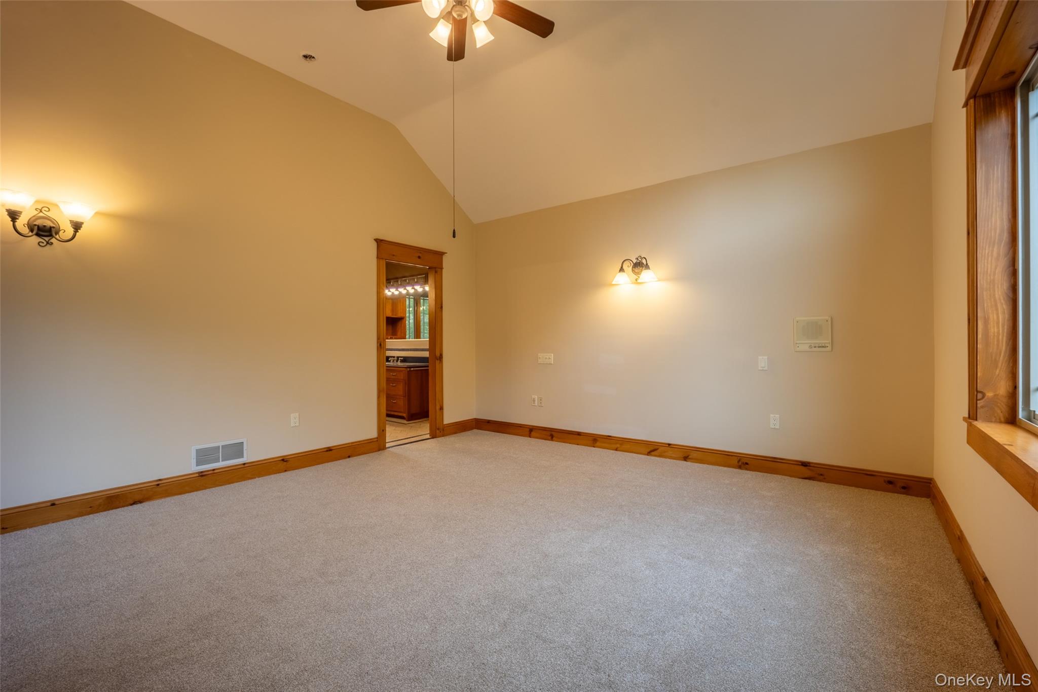 243 Hawleys Corners Road Highland, NY 12528 - Photo 17 of 44 an empty room with closet and windows