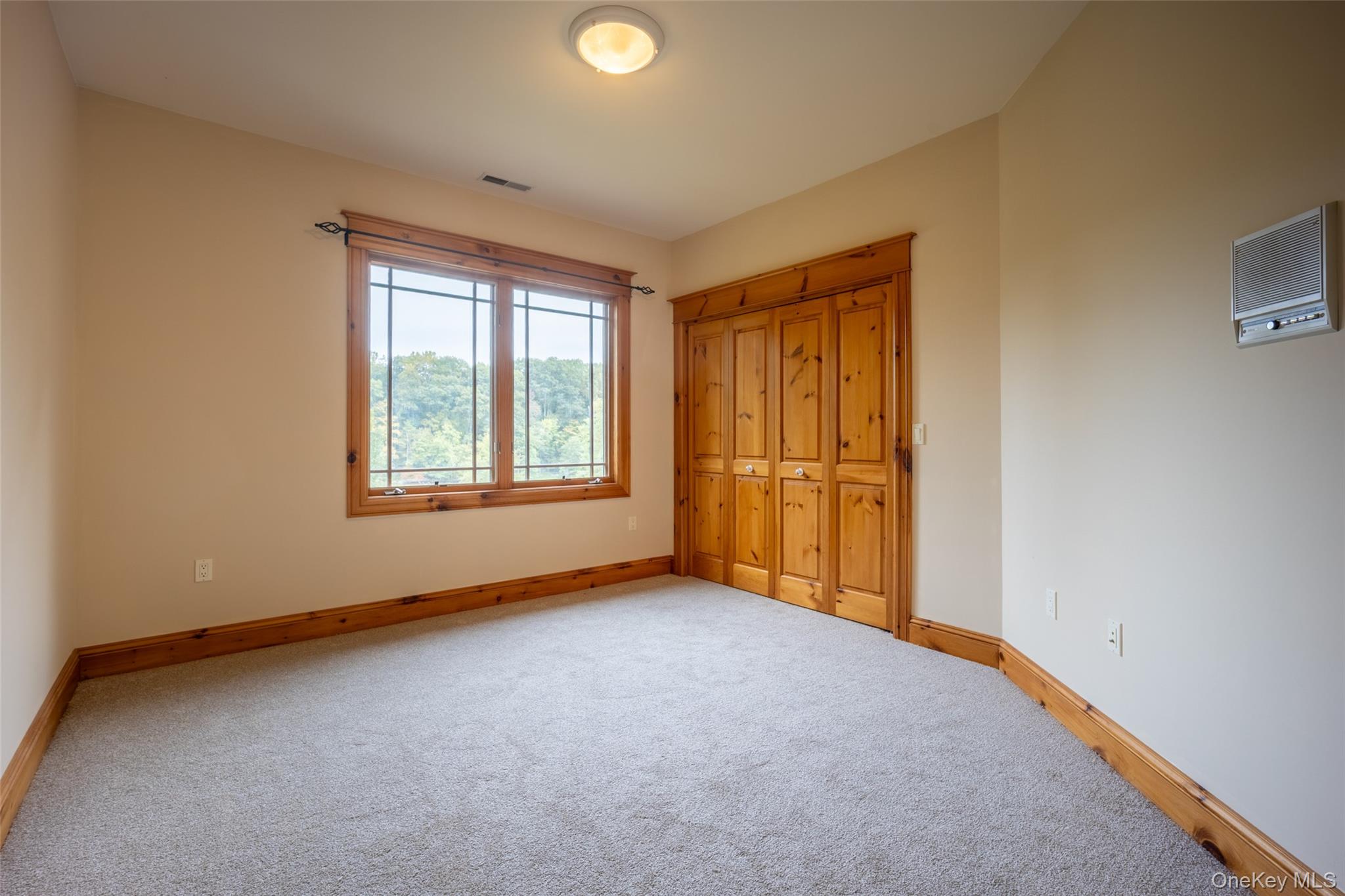 243 Hawleys Corners Road Highland, NY 12528 - Photo 21 of 44 an empty room with windows