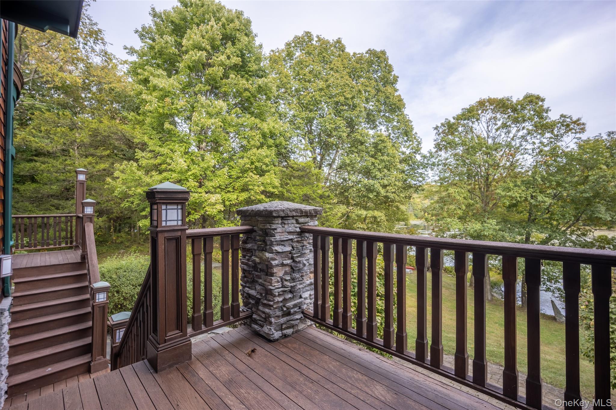 243 Hawleys Corners Road Highland, NY 12528 - Photo 28 of 44 a balcony with wooden floor and outdoor seating