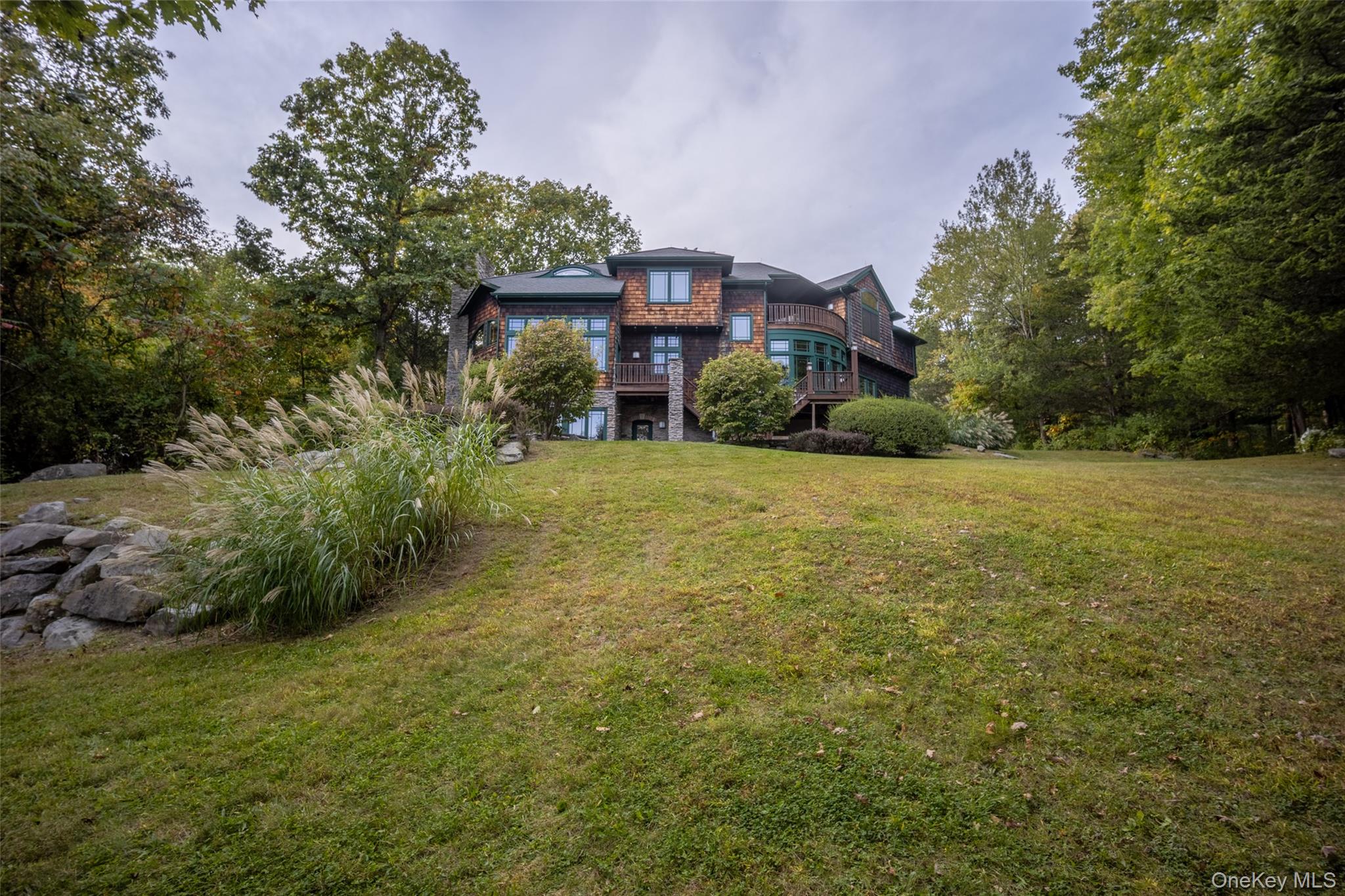 243 Hawleys Corners Road Highland, NY 12528 - Photo 34 of 44 a view of a large garden with plants and large trees