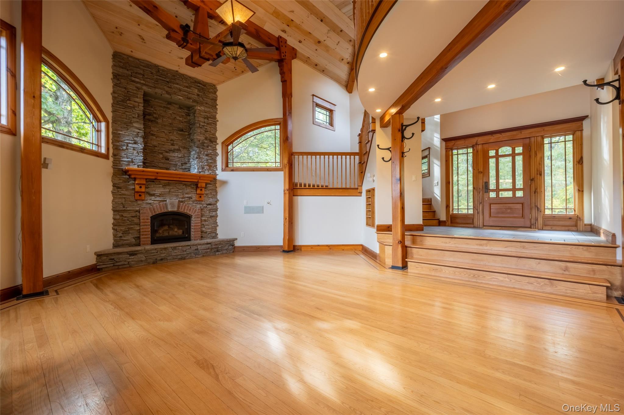 243 Hawleys Corners Road Highland, NY 12528 - Photo 4 of 44 a view of empty room with fireplace and windows