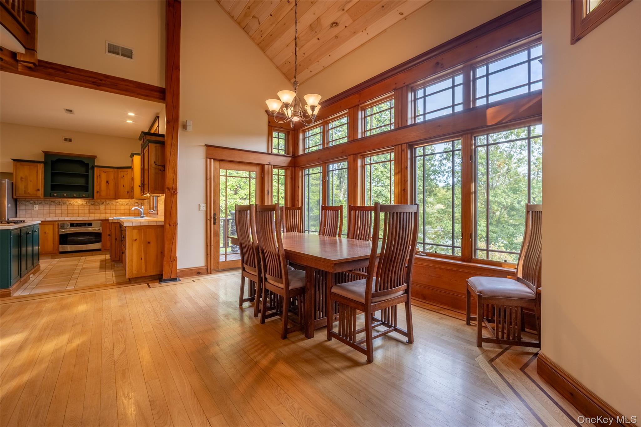 243 Hawleys Corners Road Highland, NY 12528 - Photo 7 of 44 a view of a dining room with furniture window and wooden floor