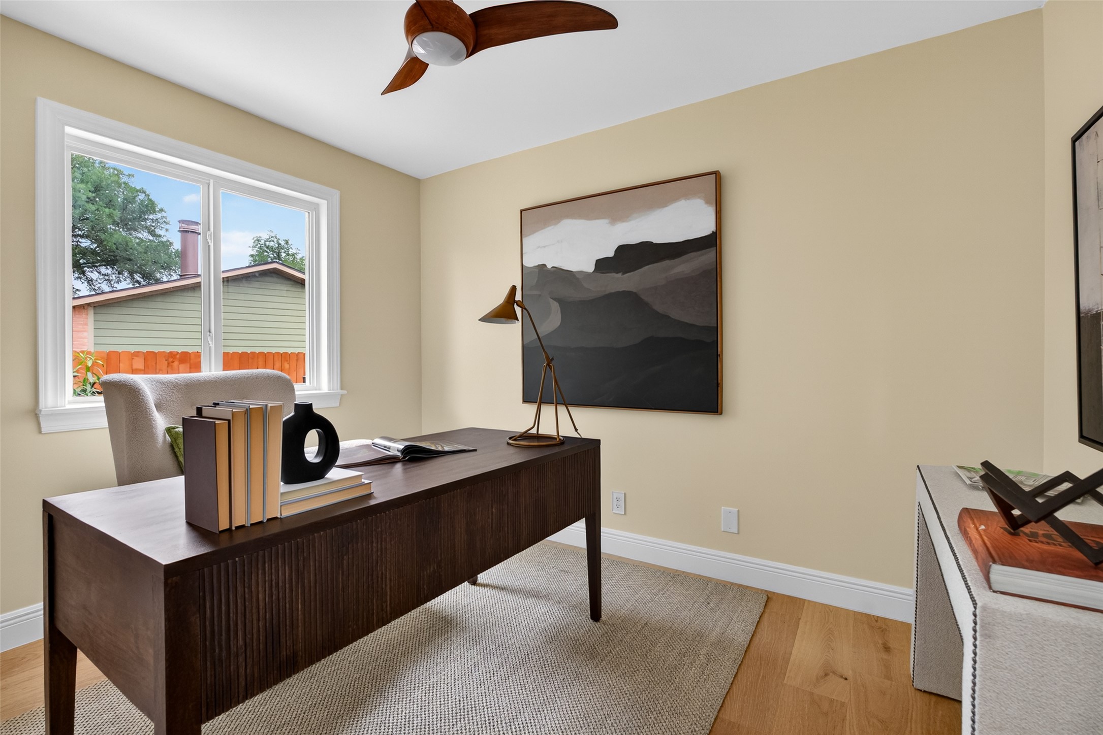 6806 Rearden Road Austin, TX 78745 - Photo 18 of 28 Bright room with light wood-finish flooring