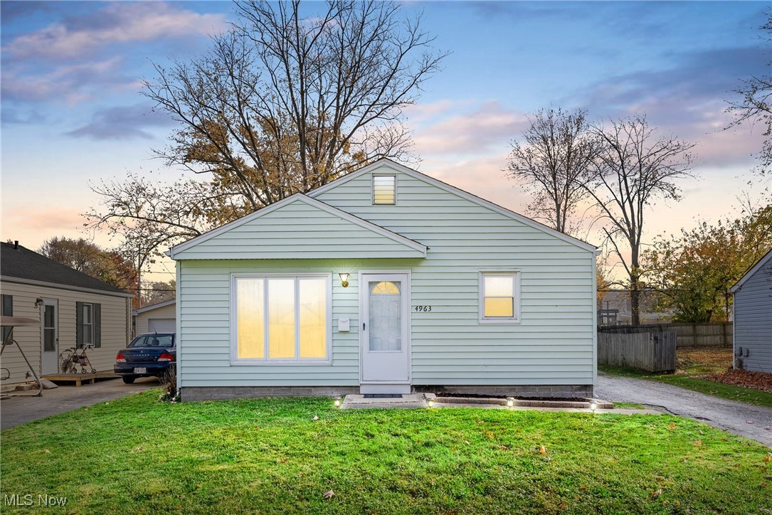 4963 Wake Robin Road Mentor, OH 44060 - Photo 1 of 21 Bungalow-style home featuring a lawn