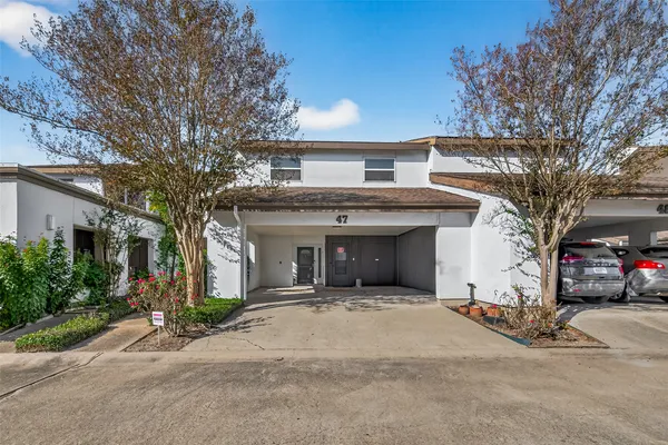 front view of a house with a street