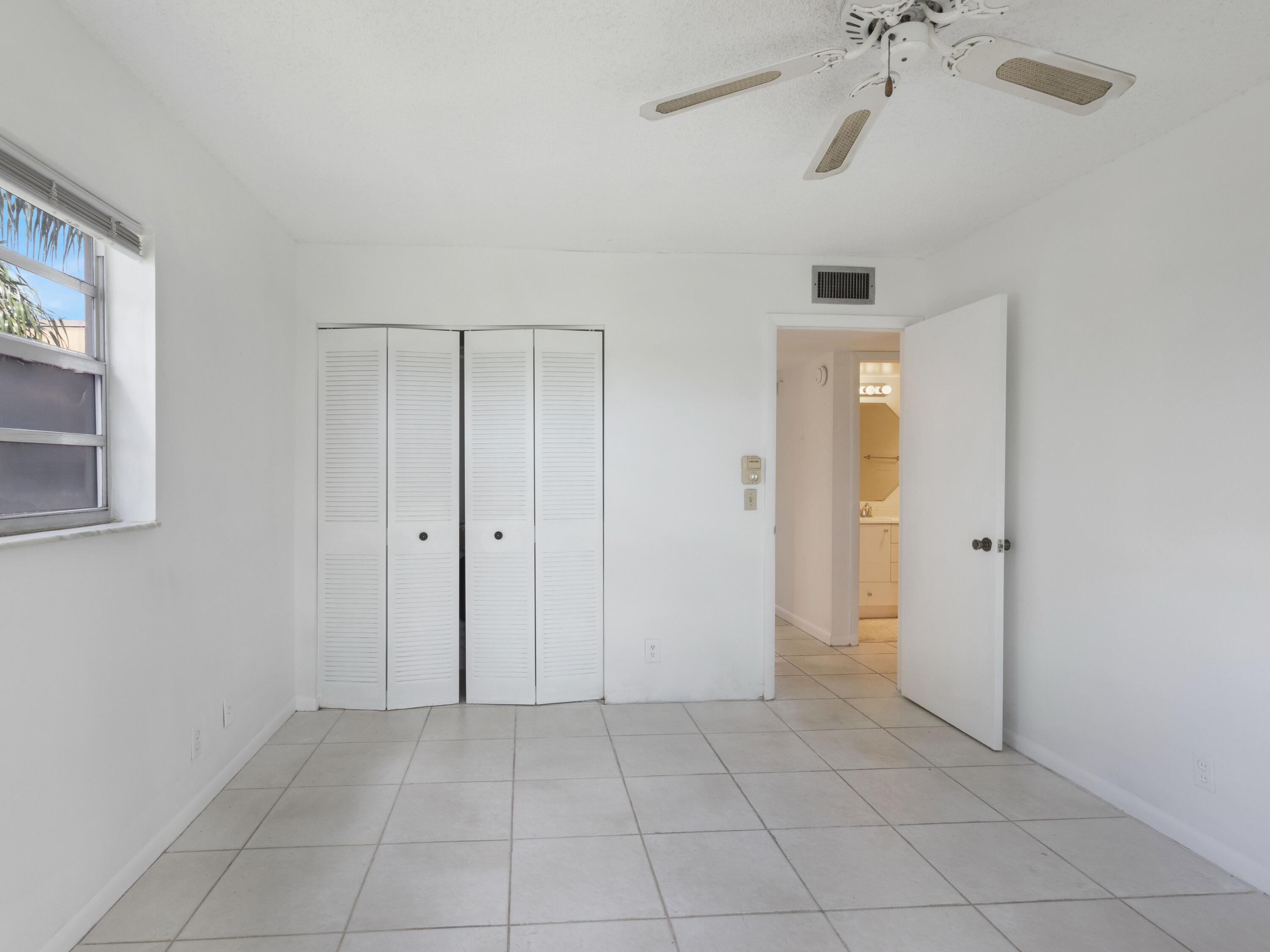 30 Flanders A Delray Beach, FL 33484 - Photo 14 of 38 Guest Bedroom