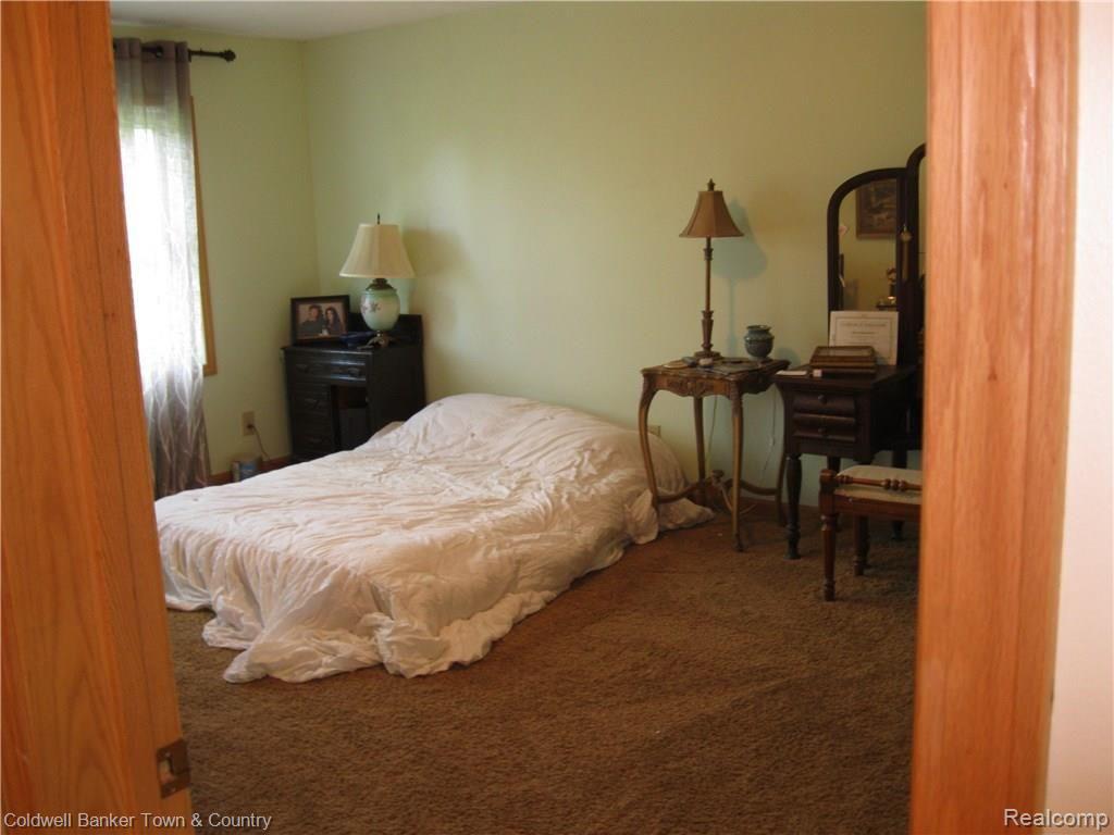 9024 North Robb Road Fowlerville, MI 48836 - Photo 12 of 21 Second bedroom