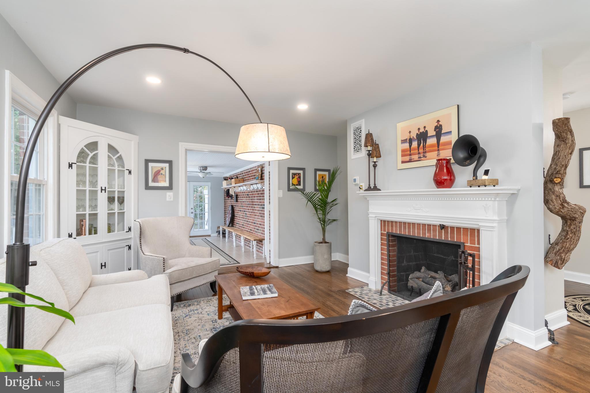 10421 Naglee Road Silver Spring, MD 20903 - Photo 11 of 50 Inviting living room with gas fireplace