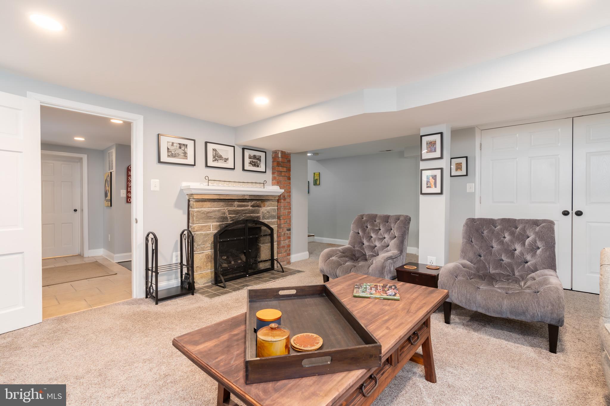 10421 Naglee Road Silver Spring, MD 20903 - Photo 33 of 50 Lower level family room with fireplace