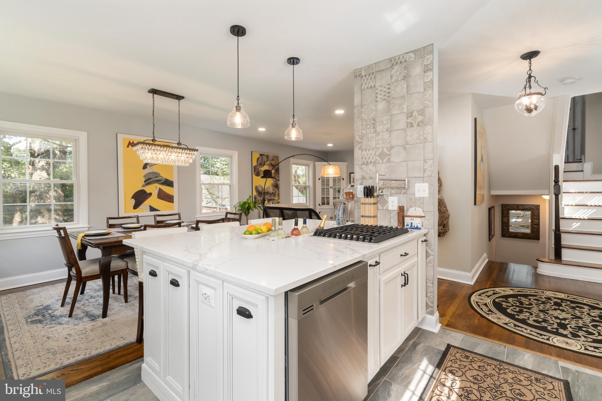 10421 Naglee Road Silver Spring, MD 20903 - Photo 4 of 50 Chef's kitchen with sleek custom-quartz counters