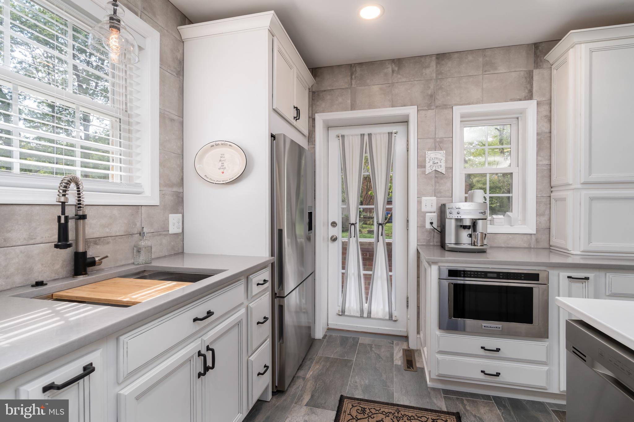 10421 Naglee Road Silver Spring, MD 20903 - Photo 7 of 50 Ample cabinet and counter space