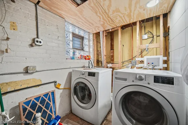 a utility room with dryer and washer